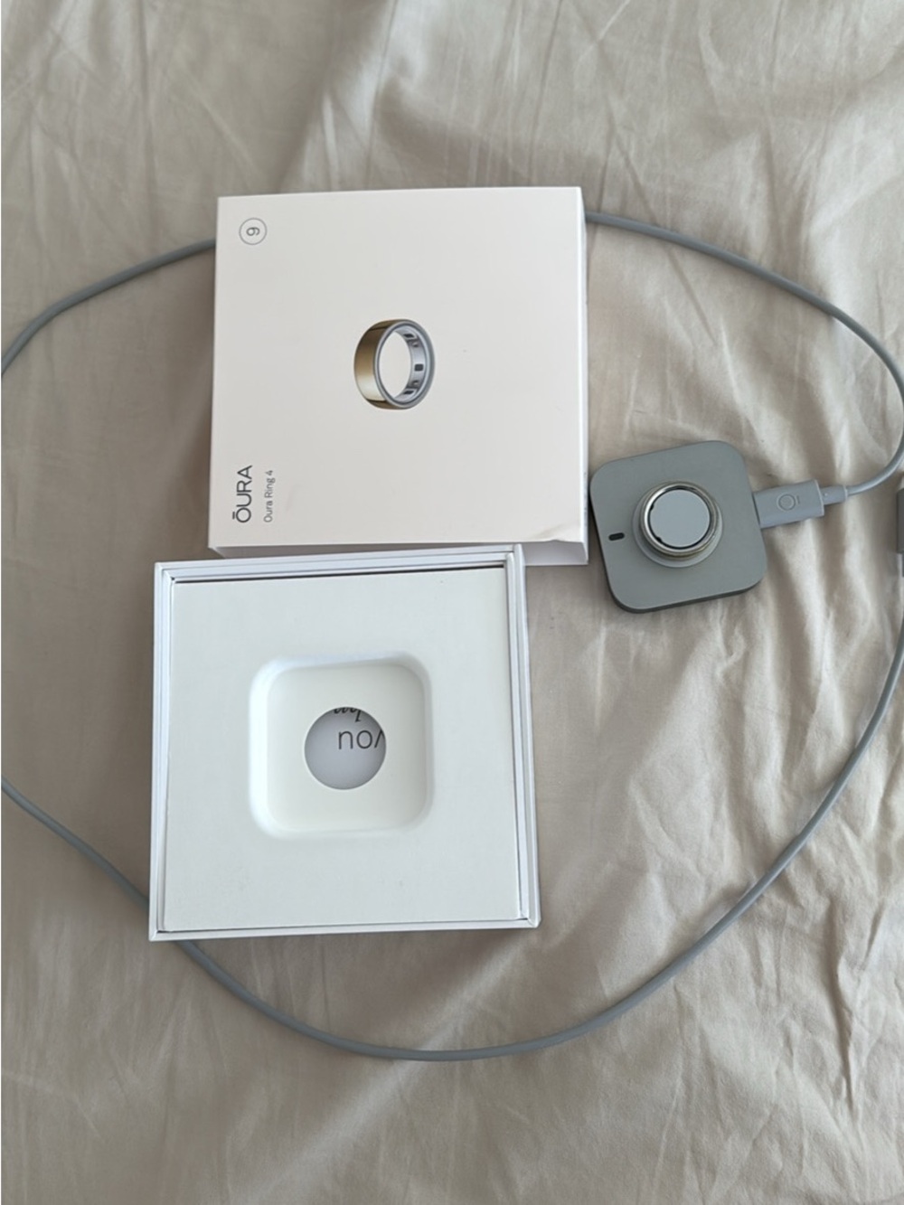 Gold oura ring with Charging Dock. gen 4 size 9